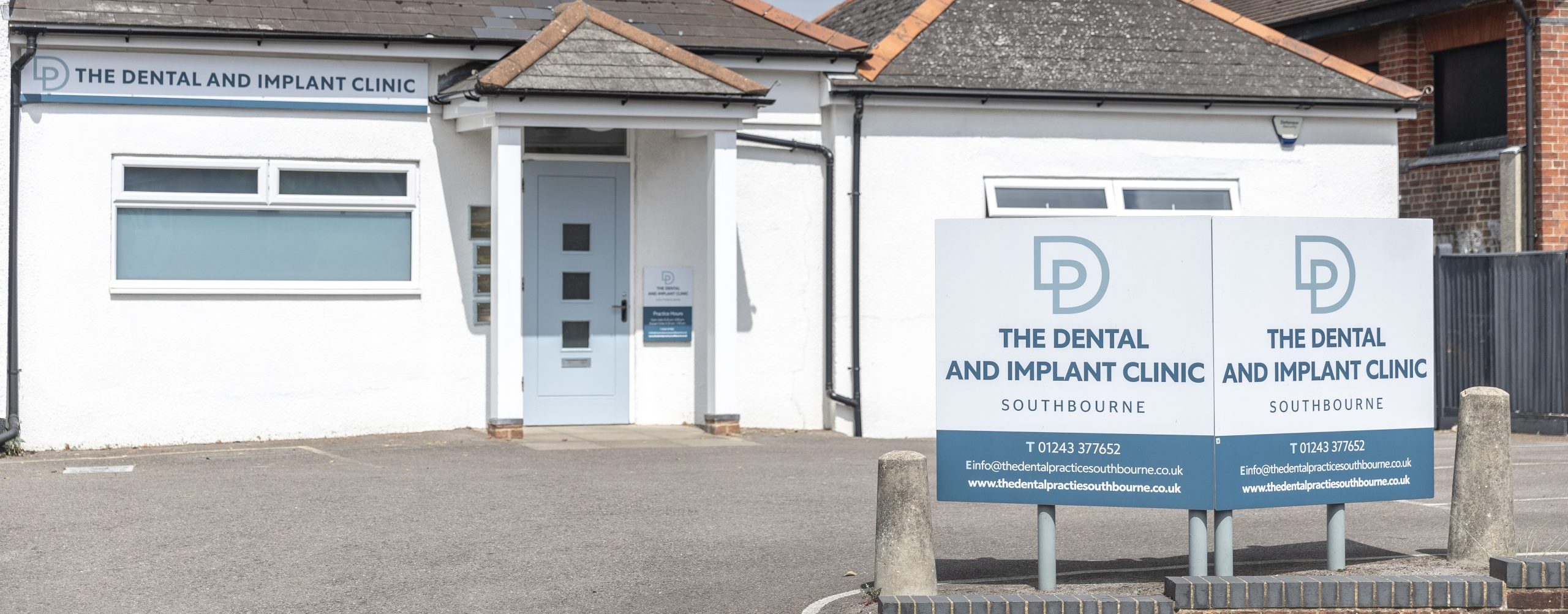 The Dental and Implant Clinic logo